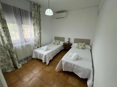 Cama o camas de una habitación en La Pradera de Gredos