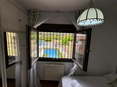 Cama o camas de una habitación en La Pradera de Gredos