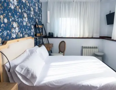 Cama o camas de una habitación en Christine Boutique Hotel