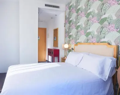Cama o camas de una habitación en Christine Boutique Hotel