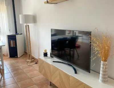 Una televisión o centro de entretenimiento en Casa Mauro