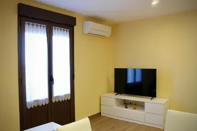 Una televisión o centro de entretenimiento en Apartamento Barranquilla