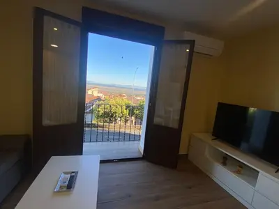 Una televisión o centro de entretenimiento en Apartamento Barranquilla