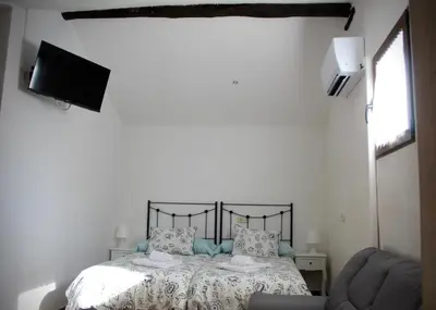 Cama o camas de una habitación en Buhardilla barranquilla