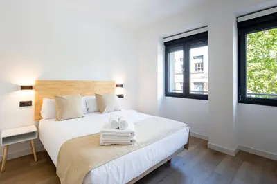 Cama o camas de una habitación en Apartamentos Turísticos D10