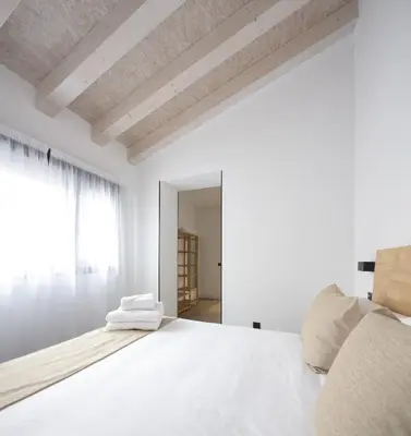 Cama o camas de una habitación en Apartamentos Turísticos D10