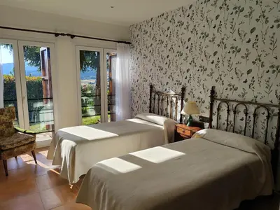 Cama o camas de una habitación en Casa Rural Villa Rosario