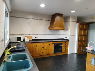 Una cocina o zona de cocina en Casa Rural Villa Rosario