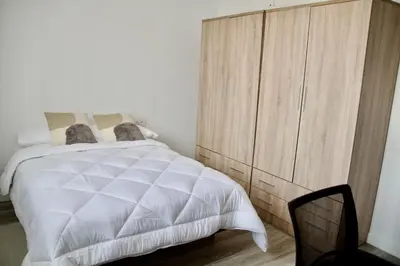 Cama o camas de una habitación en Los Miliarios