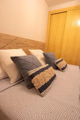 Cama o camas de una habitación en Casita El Gorrión