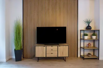 Una televisión o centro de entretenimiento en Encantador piso a 7 min de Salamanca by beBalmy
