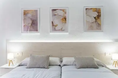 Cama o camas de una habitación en Encantador piso a 7 min de Salamanca by beBalmy