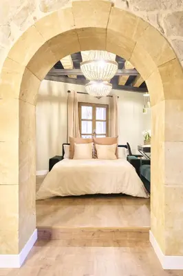 Cama o camas de una habitación en El capricho Balcón en la Plaza Mayor Salamanca Collection Luxury