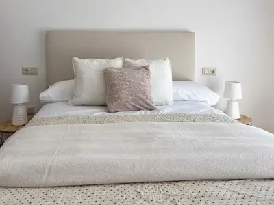 Cama o camas de una habitación en CerezasHomes3