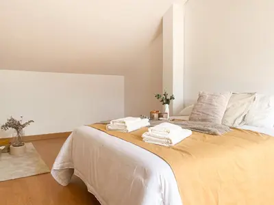 Cama o camas de una habitación en CerezasHomes3