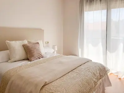 Cama o camas de una habitación en CerezasHomes5