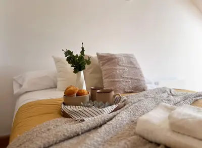 Cama o camas de una habitación en CerezasHomes5