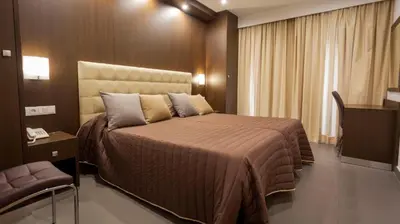 Cama o camas de una habitación en Hotel Rambla Emérita, centro ciudad