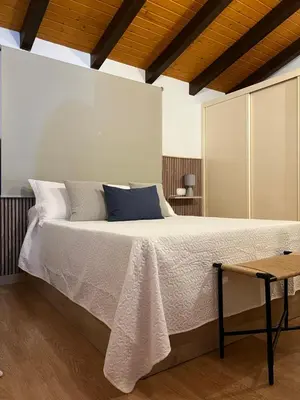 Cama o camas de una habitación en San Antonio 6
