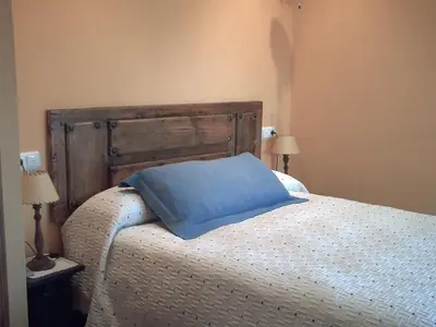 Cama o camas de una habitación en El Condado Casa Rural