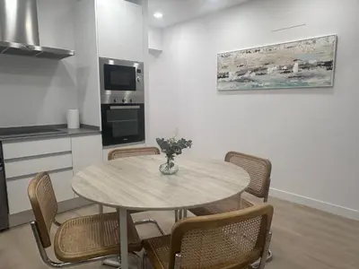 Una cocina o zona de cocina en Apartamentos Paseo de la Estación