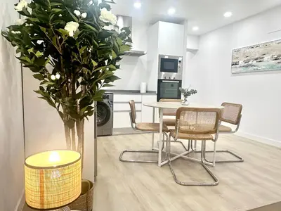 Una cocina o zona de cocina en Apartamentos Paseo de la Estación