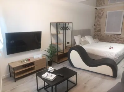 Cama o camas de una habitación en The Romantic Loft