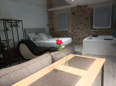 Cama o camas de una habitación en The Romantic Loft
