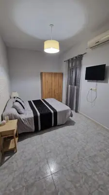 Cama o camas de una habitación en Villa Izael AT-BA-00317