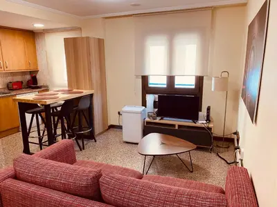 Una televisión o centro de entretenimiento en Casa de la Torre by Salamancavacacional