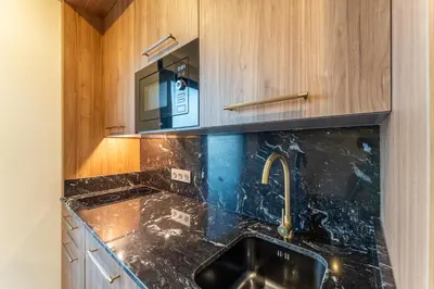 Una cocina o zona de cocina en Apartamentos Turísticos GÁLEA