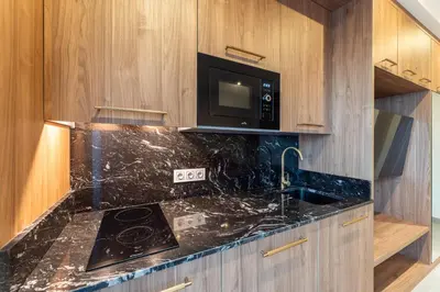Una cocina o zona de cocina en Apartamentos Turísticos GÁLEA