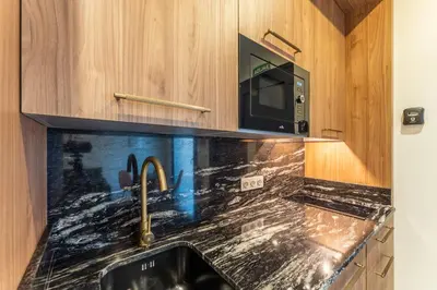 Una cocina o zona de cocina en Apartamentos Turísticos GÁLEA