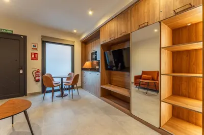 Una cocina o zona de cocina en Apartamentos Turísticos GÁLEA