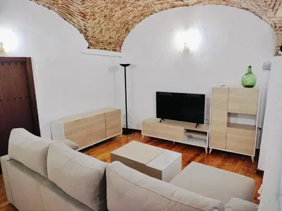 Una televisión o centro de entretenimiento en Apartamento turistico Jimena y Mateo RR