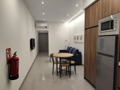 Una cocina o zona de cocina en Apartamentos La Montehermoseña