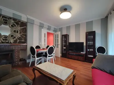 Una televisión o centro de entretenimiento en Casa Perulo