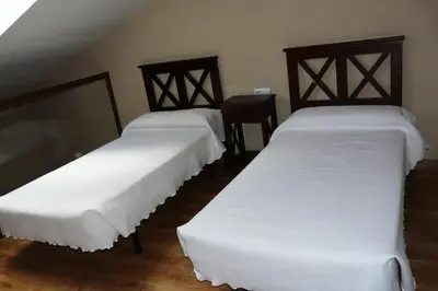 Cama o camas de una habitación en Apartamentos Valle&Snow