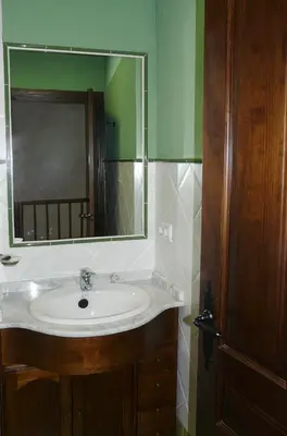 Un baño de Apartamentos Valle&Snow
