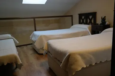 Cama o camas de una habitación en Apartamentos Valle&Snow