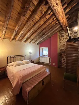 Cama o camas de una habitación en Casa Rural La Casa de Piedra
