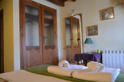 Cama o camas de una habitación en Casa Rural La Casa de Piedra