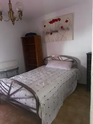Cama o camas de una habitación en Parcela