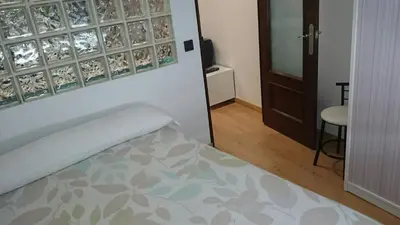 Cama o camas de una habitación en Apartamentos Salamanca Puerta Zamora, Centro, Wifi con salón y 2 dormitorios, Parking