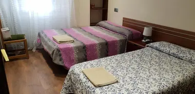 Cama o camas de una habitación en Apartamentos Salamanca Puerta Zamora, Centro, Wifi con salón y 2 dormitorios, Parking