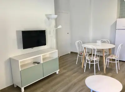 Una televisión o centro de entretenimiento en Apartamento San Miguel Nº1