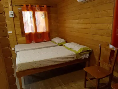Cama o camas de una habitación en Camping La Eliza Lanzahíta