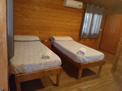 Cama o camas de una habitación en Camping La Eliza Lanzahíta