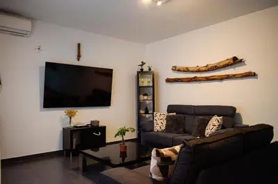 Una televisión o centro de entretenimiento en Domus Citrus