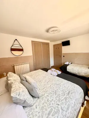 Cama o camas de una habitación en El Balcón De Gredos